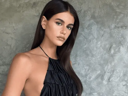 Kaia Gerber with dark brunette hair