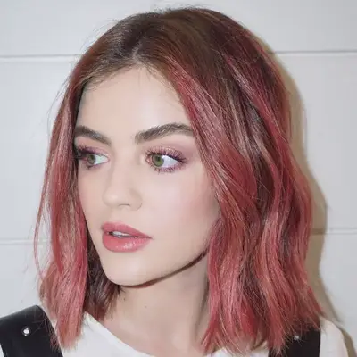 Lucy Hale wears a pink ombré balayage long bob hairstyle