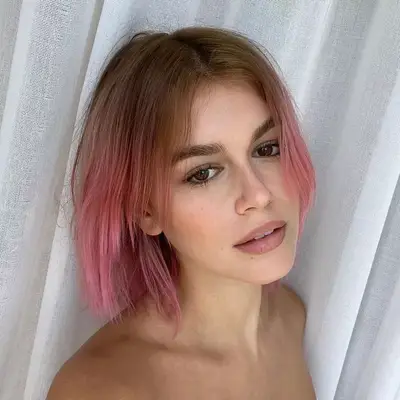 Kaia Gerber wears a pink ombré bob hairstyle