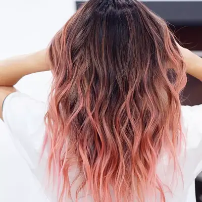 Long, wavy, flamingo pink ombré hair