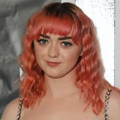 Maisie Williams with crimped pink hair and straight bangs at the 2019 SUPER Magazine x CONTACT agency launch party in London. England 