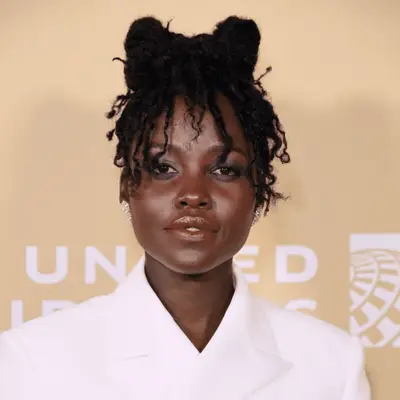 Camila Cabello with side-swept straight bangs and curly hair at the 2019 Variety Power of Young Hollywood event in Los Angeles