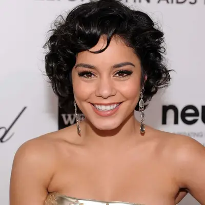 Vanessa Hudgens with short wavy hair at the 2012 Elton John AIDS Foundation Academy Awards Viewing Party in Beverly Hills, California
