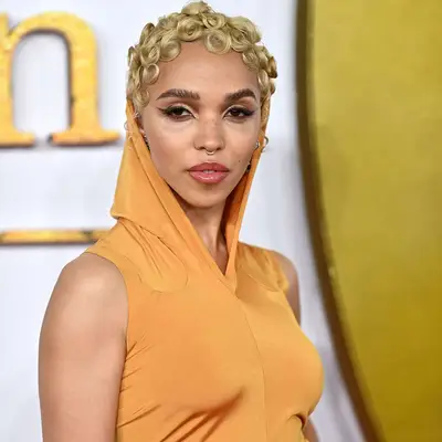 FKA Twigs with short, blonde retro pin curls at the 2021 