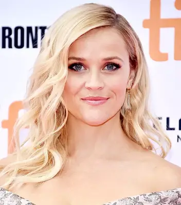 Close up of Reese Witherspoon with long, layered wavy hair