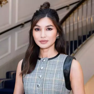 Close up of Rowan Blanchard with a textured pixie cut and a red lip