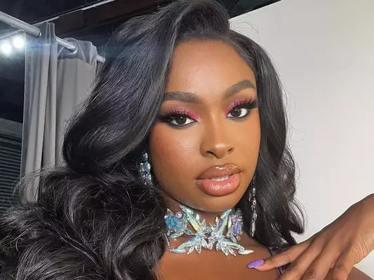coco jones wearing hollywood waves