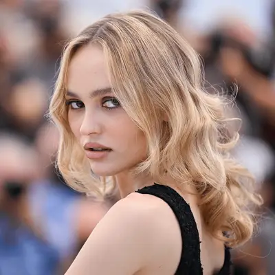 Sofia Richie Grainge wearing a bright green jacket