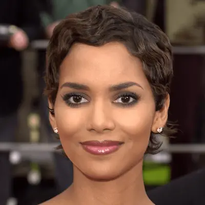Halle Berry with a short, wavy pixie.