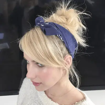 Katy Perry wears long, dark hair with 