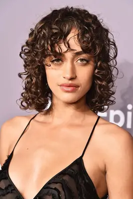 Alanna Arrington with curly bob 