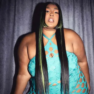 Lizzo with a bold layered haircut