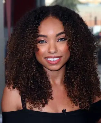 Logan Browning with curly hair 