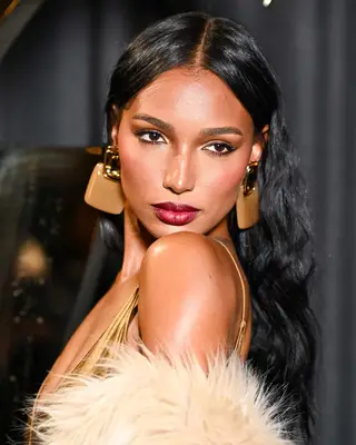 Jasmine Tookes with wavy hair