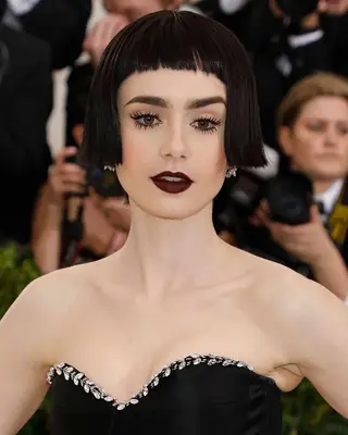 Lilly Collins with baby bags and extreme bob