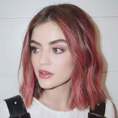 Lucy Hale with deep pink wavy lob Rose Gold Hair