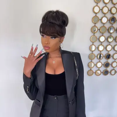 megan thee stallion wearing a cute messy bun