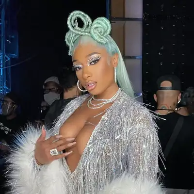 megan thee stallion wearing seafoam green hair