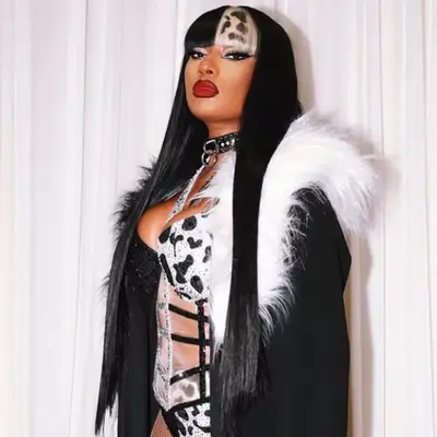 megan thee stallion wearing dalmation-inspired bangs
