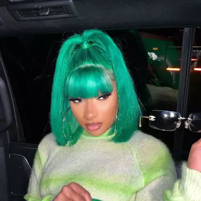 Megan Thee Stallion with hip-length spiraled hair