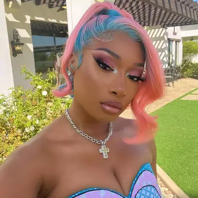 Megan Thee Stallion with platinum old hollywood waves at Mean Girls Musical premier