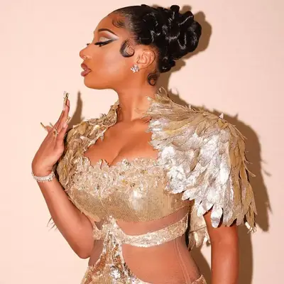 Megan Thee Stallion with 90