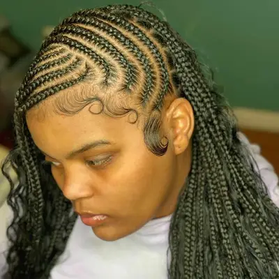 a woman with fulani braids hairstyle