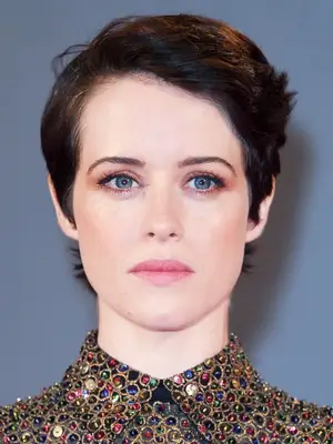 short hairstyles: Claire Foy with short brown hair and a quiff