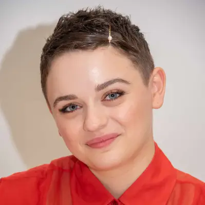 Joey King with buzzed fade and barrette