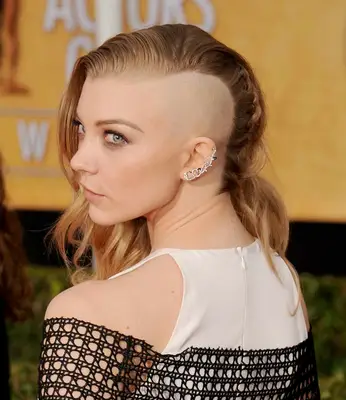 Natalie Dormer with a one-sided shaved hairstyle on the red carpet
