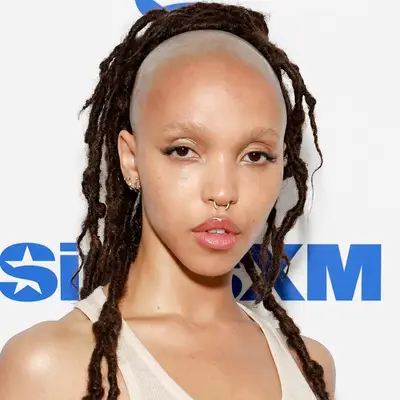 FKA Twigs with a half shaven head and brown locs during the SiriusXM studio visit in New York City August 2024