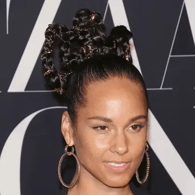 Alicia Keys with a braided high ponytail
