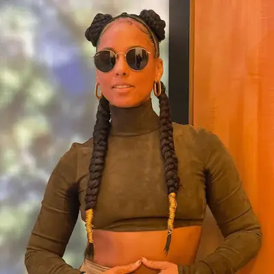 Alicia Keys with her hair braided and bejeweled 