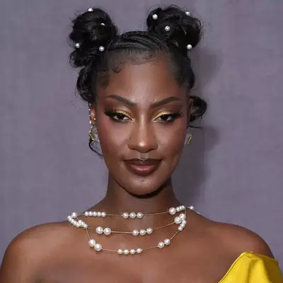 Madison Bailey wears natural curls at golden hour