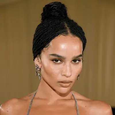 zoe kravitz wearing microbraid french twist