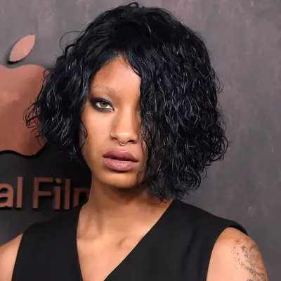 willow smith wearing a wet look curly bob