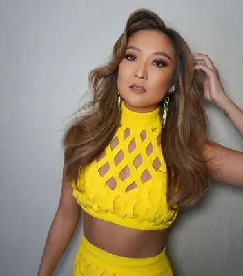 Ashley Park long light brown hair