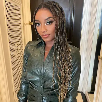Simone Biles with brown and blonde balayage braids