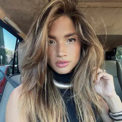 Rocky Barnes with brown and blonde balayage hair