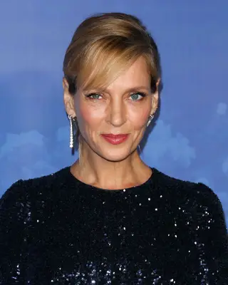 Uma Thurman with dee pside bangs