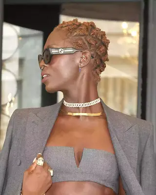 Actor Jodie Turner-Smith with her hair in ginger micro Bantu knots