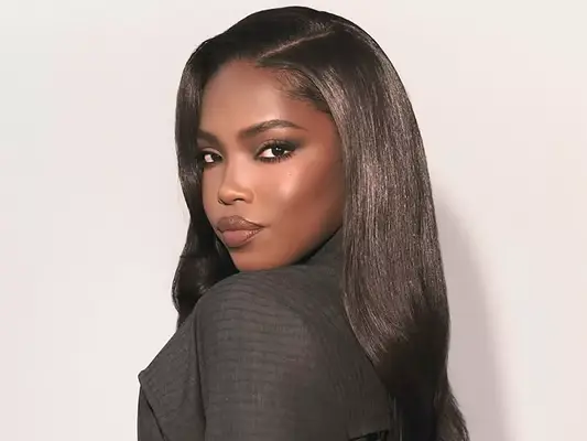 actor ryan destiny with long, straight, shiny hair