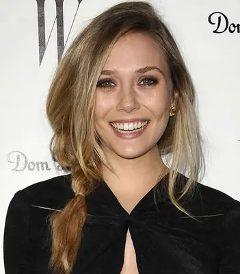Elizabeth Olsen with a side braid hairstyle.