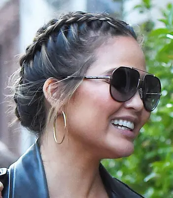 Chrissy Teigen with braided hair.