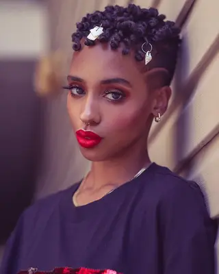 Curly bejeweled fauxhawk