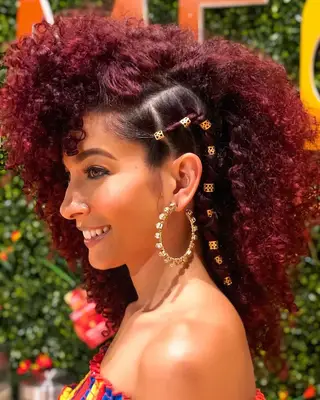 Long, curly red faux hawk