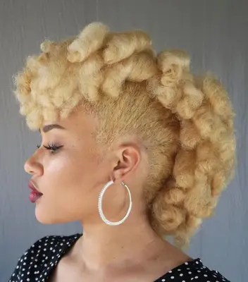 Curly blonde fauxhawk