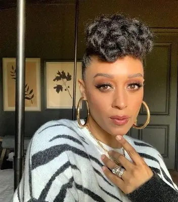 Tia Mowry curly fauxhawk