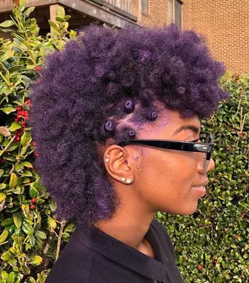 Purple frohawk and bantu knots