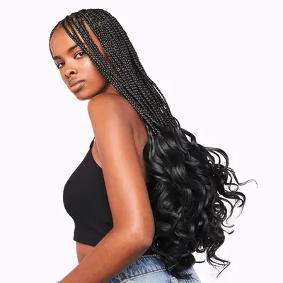 Woman modeling Ruka French curl braiding hair 